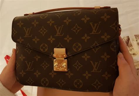 como saber si una cartera de louis vuitton es original|authentic Louis Vuitton handbag.